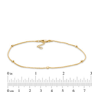 Diamond-Cut Bead Station Anklet in 10K Gold - 10"