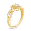 1/3 CT. T.W. Baguette and Round Trio Diamond Heart Frame Crossover Split Shank Ring in 10K Gold
