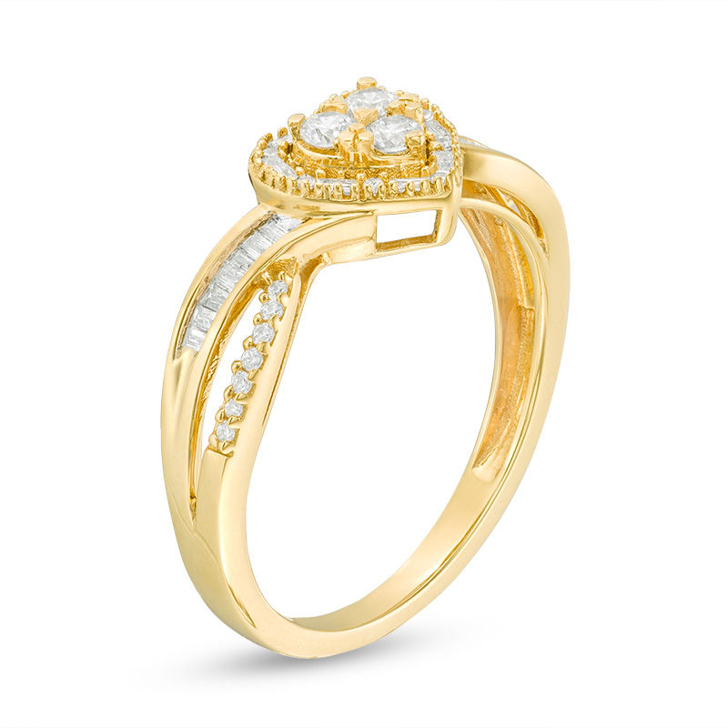 1/3 CT. T.W. Baguette and Round Trio Diamond Heart Frame Crossover Split Shank Ring in 10K Gold
