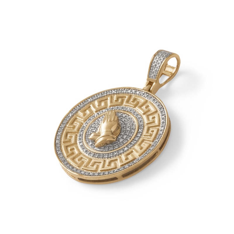 Main Image 2 of 1/4 CT. T.W. Diamond Praying Hands and Greek Key Medallion Necklace Charm in 10K Gold
