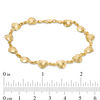 Faceted Puff Heart Station Bracelet in 10K Gold - 7.5"
