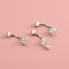 Thumbnail Image 1 of 10K Solid Gold CZ Pear-Shaped Dangle Flower Belly Button Ring - 14G