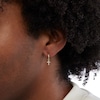 Thumbnail Image 2 of 1/20 CT. T.W. Diamond Cross Huggie Hoop Earrings in 10K Gold