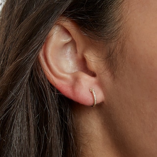 1/20 CT. T.W. Diamond Huggie Hoop Earrings in 10K Gold