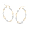 Thumbnail Image 1 of 30mm Diamond-Cut Twist Hoop Earrings in 14K Tube Hollow Two-Tone Gold