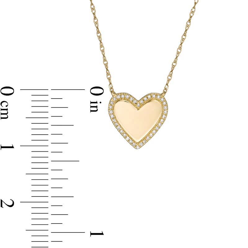 1/20 CT. T.W. Diamond Frame Heart Disc Necklace in10K Gold
