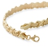 Thumbnail Image 1 of Heart "X" Stampato Bracelet in 10K Semi-Solid Gold - 7.5"