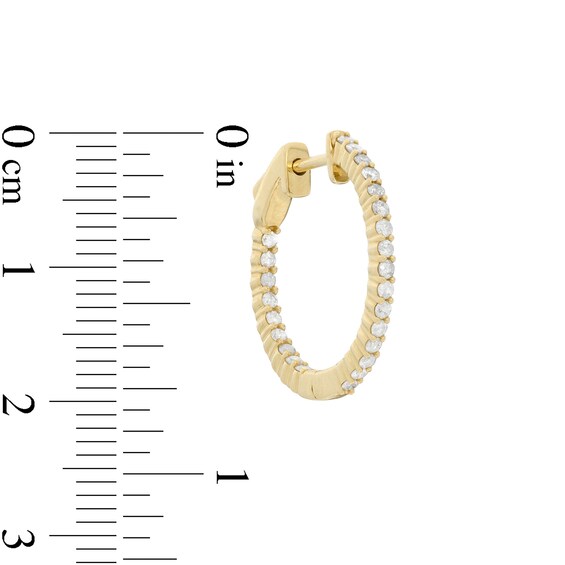 1/2 CT. T.W. Diamond Inside-Out 15.5mm Hoop Earrings in 10K Gold