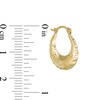 Thumbnail Image 1 of Child's Flower Stamp Hoop Earrings in 10K Stamp Hollow Gold