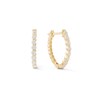 Thumbnail Image 0 of Cubic Zirconia Oval Huggie Hoop Earrings in 10K Gold