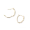 Thumbnail Image 1 of Cubic Zirconia Oval Huggie Hoop Earrings in 10K Gold