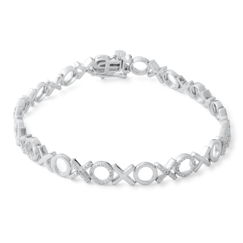 Main Image 1 of Sterling Silver 1/10 CT. T.W. Diamond "XO" Bracelet - 7.5"