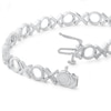 Thumbnail Image 1 of 1/10 CT. T.W. Diamond "XO" Line Bracelet in Sterling Silver - 7.5"
