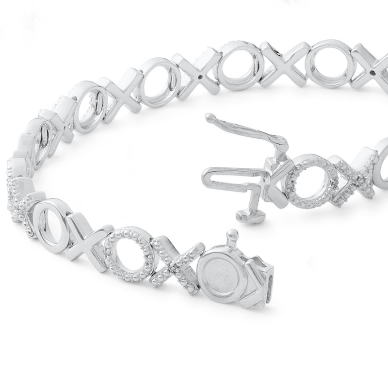 1/10 CT. T.W. Diamond "XO" Line Bracelet in Sterling Silver - 7.5"