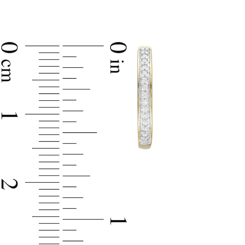 Main Image 2 of 1/10 CT. T.W. Diamond Huggie Hoop Earrings in 10K Gold