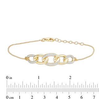 1/10 CT. T.W. Diamond Graduated Chain Link Bracelet in Sterling Silver with 14K Gold Plate - 7.25"