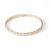 Thumbnail Image 1 of Diamond-Cut Hearts Stampato Bracelet in 10K Hollow Tri-Tone Gold - 7.25"