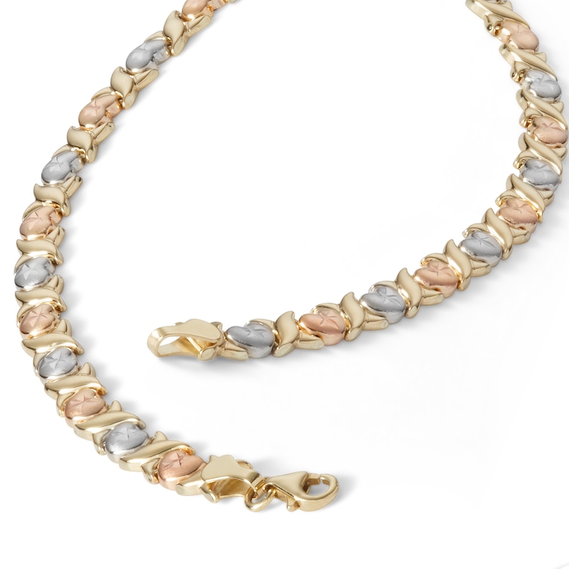 Main Image 2 of Diamond-Cut Hearts Stampato Bracelet in 10K Hollow Tri-Tone Gold - 7.25"