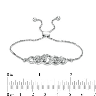 1/6 CT. T.W. Diamond Graduated Open Flame Bolo Bracelet in Sterling Silver - 10"