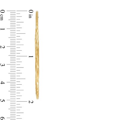 Continuous Diamond-Cut 50mm Hollow Hoop Earrings in 10K Gold