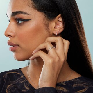 1/20 CT. T.W. Diamond Huggie Hoop Earrings in Sterling Silver