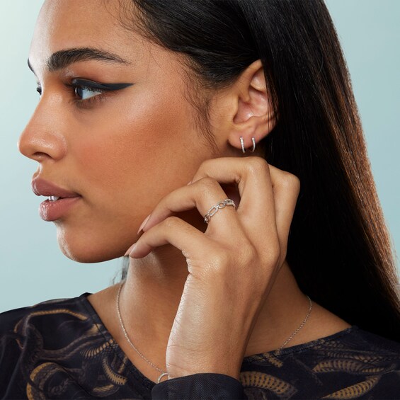 1/20 CT. T.W. Diamond Huggie Hoop Earrings in Sterling Silver