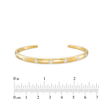 1/10 CT. T.W. Diamond Bangle Bracelet in Sterling Silver with 14K Gold Plate