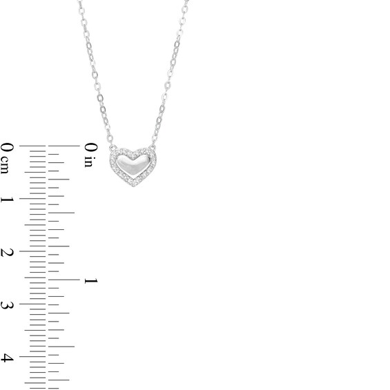 1/15 CT. T.W. Diamond Mirror Heart Pendant Necklace in Sterling Silver - 18"