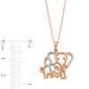 Thumbnail Image 3 of 14K Rose Gold Plated 1/20 CT. T.W. Diamond Two Elephant Pendant - 18"