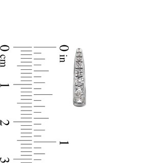 ​​​​​​​Sterling Silver CZ Graduated Stone Huggies