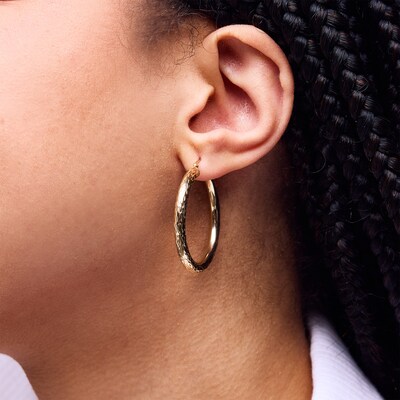 10K Hollow Gold Diamond-Cut X Hoops