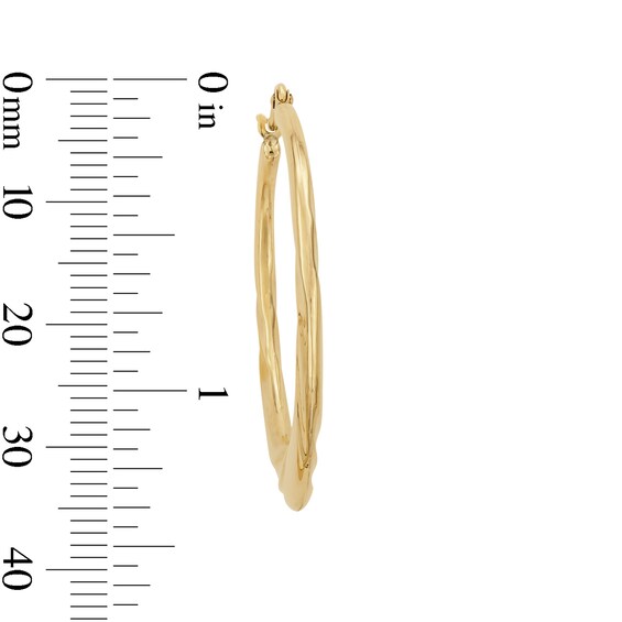 10K Hollow Gold Swirl Hoops