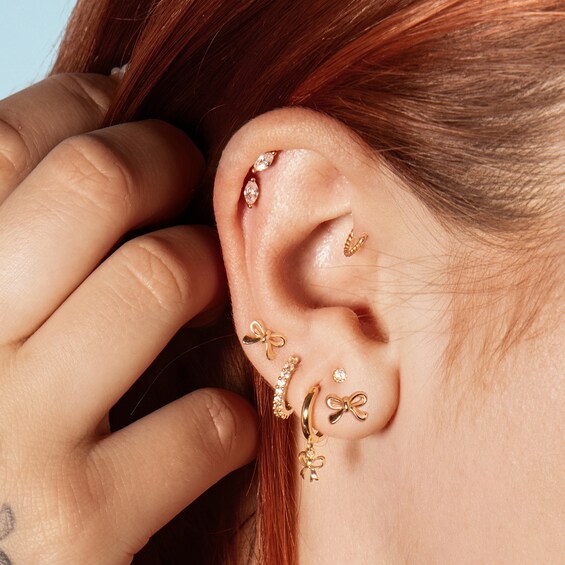 10K Gold Bow Huggie Hoops