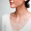 10K Gold 1/5 CT. T.W. Diamond Heart-Shaped Frame Pendant - 18"