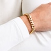 14K Gold Plated 1/10 CT. T.W. Diamond Curb Link Bracelet