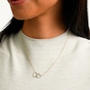 10K Solid Gold 1/10 CT. T.W. Diamond Double Heart Necklace