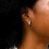 ​​​​​​​10K Hollow White Gold Diamond Cut Huggie Hoops